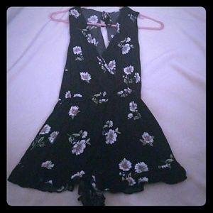 Black romper with white flowers